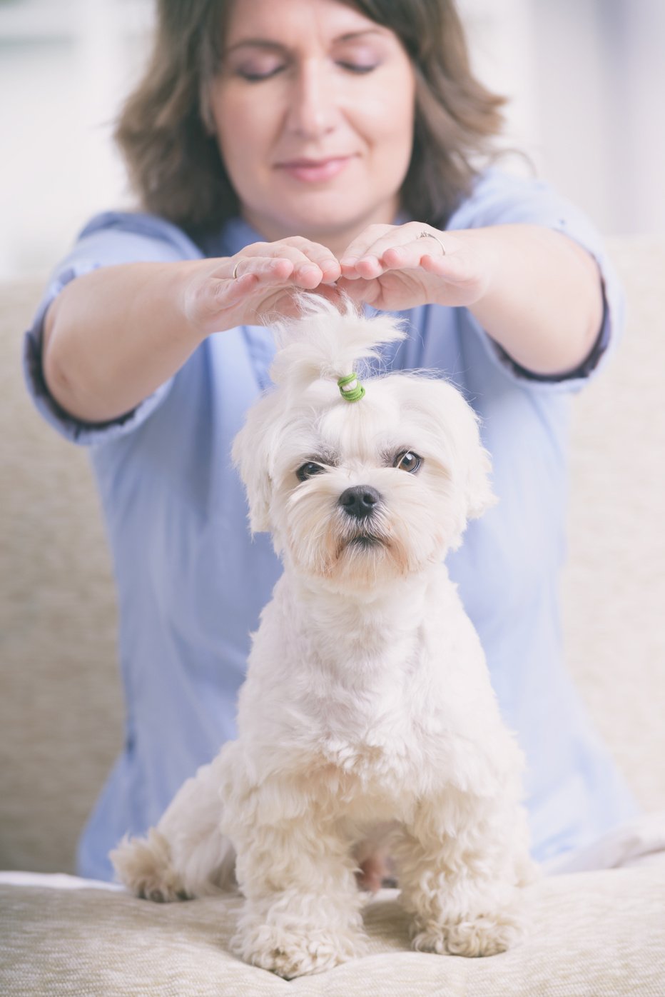 Woman practicing reiki therapy